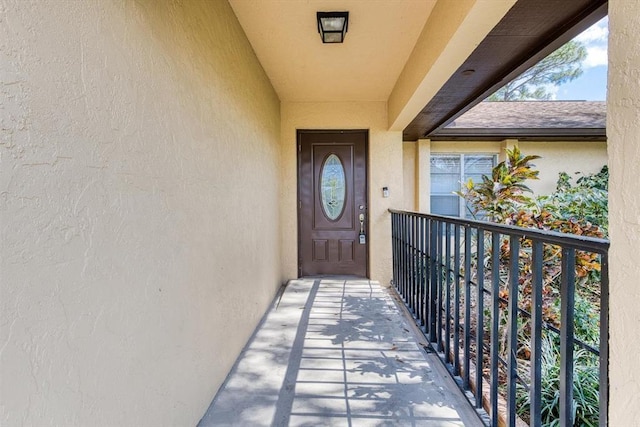 doorway to property with a balcony