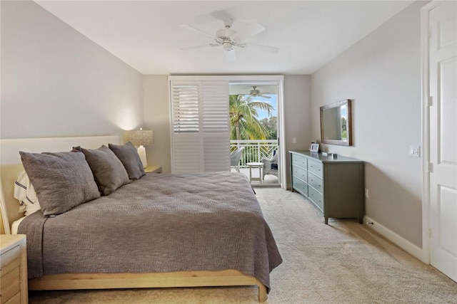 940 Turtle Cove Ln Unit 207, Vero Beach, FL 32963 - bedroom with access to exterior, light carpet, and ceiling fan