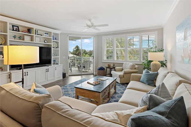 940 Turtle Cove Ln Unit 207, Vero Beach, FL 32963 - living room with a ceiling fan, dark wood-style floors, and crown molding