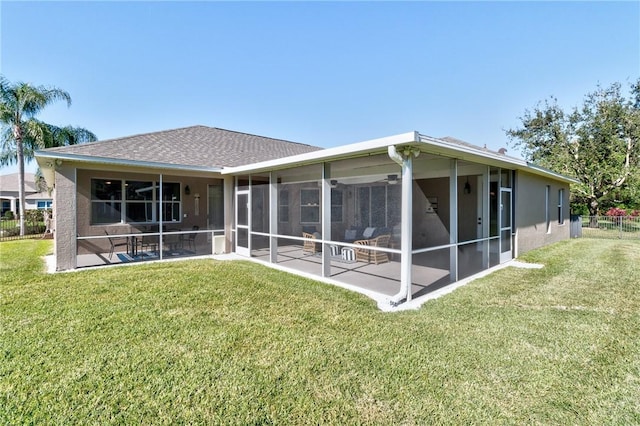 1337 Scarlet Oak Cir, Vero Beach, FL 32966 - back of property featuring a sunroom, roof with shingles, and stucco siding