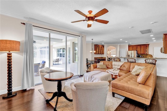 1337 Scarlet Oak Cir, Vero Beach, FL 32966 - living area with a ceiling fan, wood finished floors, arched walkways, baseboards, and recessed lighting