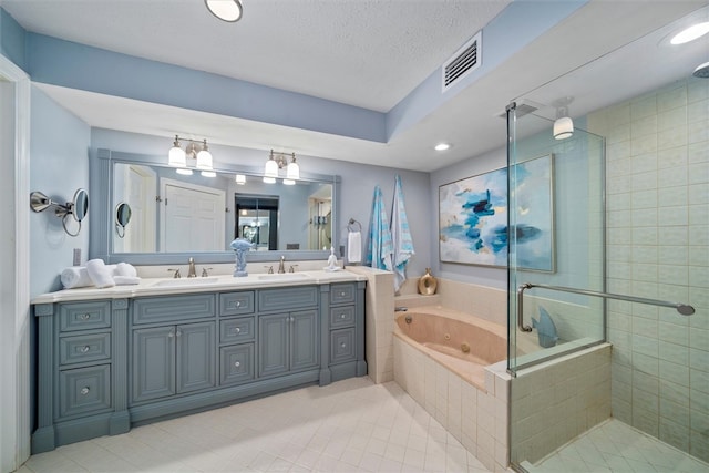 bathroom with shower with separate bathtub, vanity, and tile patterned floors