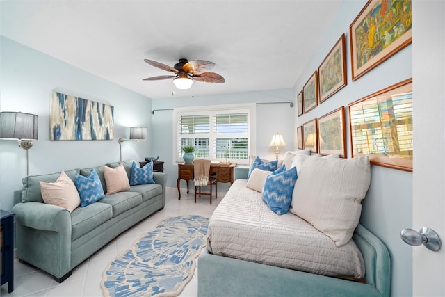 living room featuring light tile patterned flooring and ceiling fan