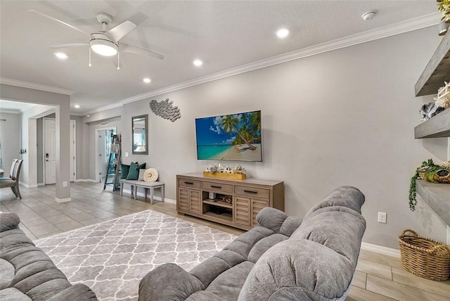 living room with ceiling fan, light tile patterned floors, recessed lighting, baseboards, and crown molding