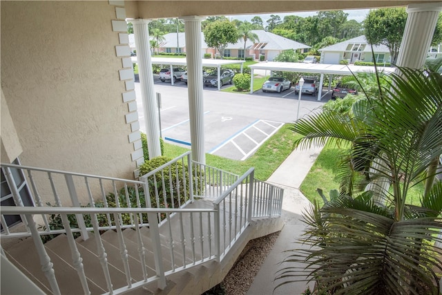 exterior space with a carport