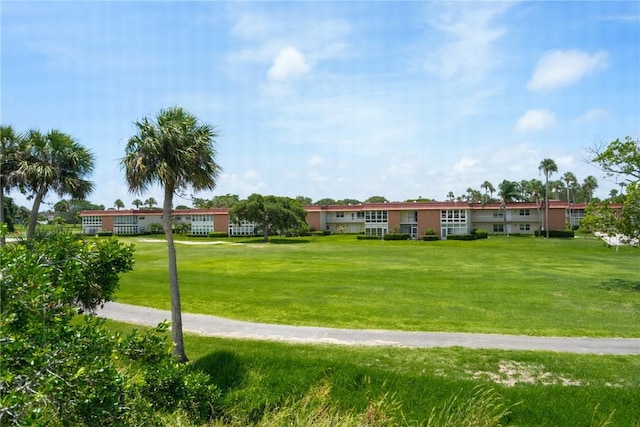 255 Grand Royale Cir Unit 204, Vero Beach, FL 32962 - view of front facade with a front lawn