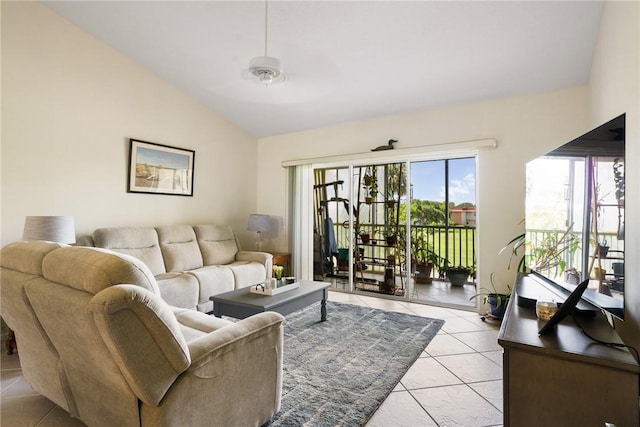 255 Grand Royale Cir Unit 204, Vero Beach, FL 32962 - living area featuring vaulted ceiling and light tile patterned floors