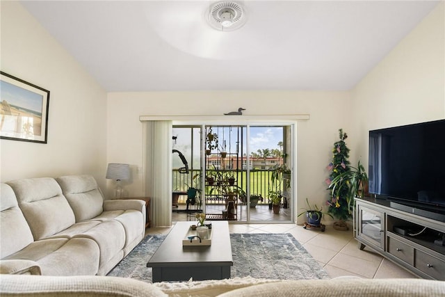 255 Grand Royale Cir Unit 204, Vero Beach, FL 32962 - living area featuring tile patterned floors and lofted ceiling