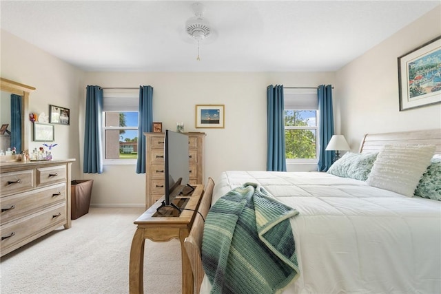 255 Grand Royale Cir Unit 204, Vero Beach, FL 32962 - bedroom featuring light carpet and baseboards