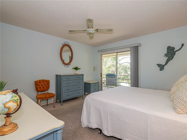 bedroom with carpet floors, a textured ceiling, ceiling fan, and access to exterior