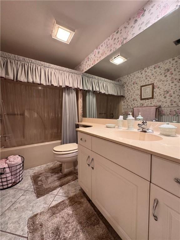 bathroom featuring toilet, wallpapered walls, shower / washtub combination, and vanity