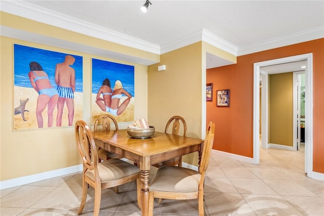 dining area with crown molding and light tile patterned flooring