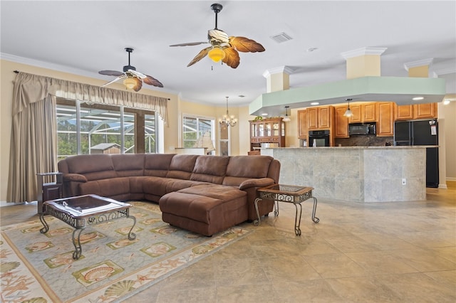 living room featuring crown molding, ceiling fan with notable chandelier, and light tile patterned floors