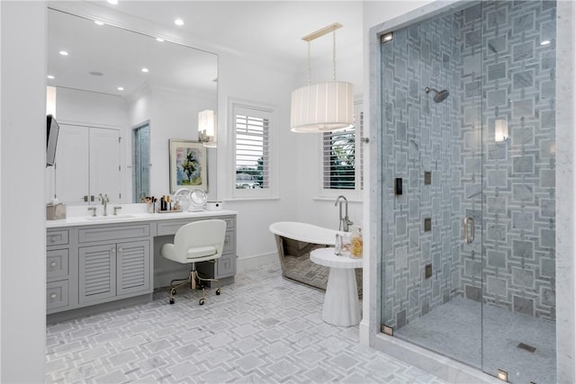 bathroom with vanity and separate shower and tub