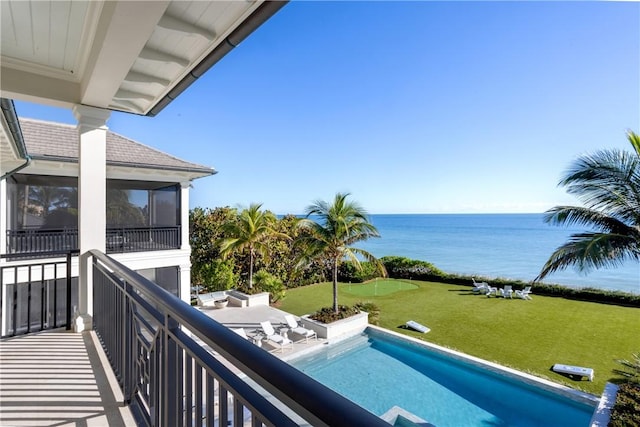 balcony featuring a water view