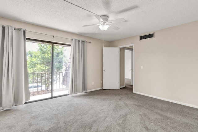 1166 6th Ave Unit 19C, Vero Beach, FL 32960 - empty room with ceiling fan, carpet flooring, a textured ceiling, and baseboards