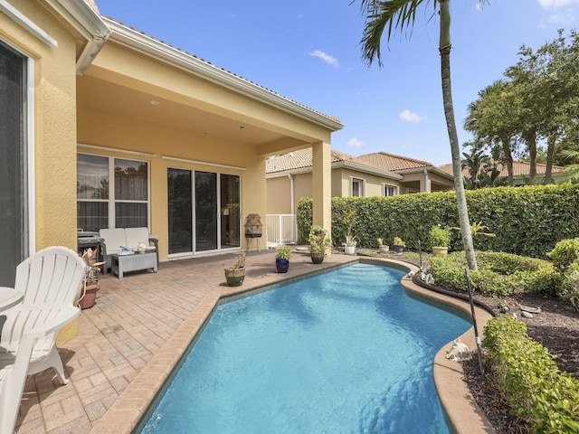 9535 E Maiden Ct, Vero Beach, FL 32963 - view of swimming pool with a patio and a fenced backyard
