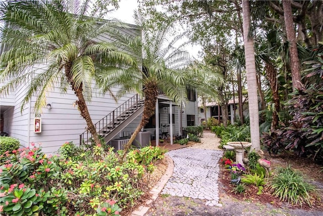 back of property with central air condition unit