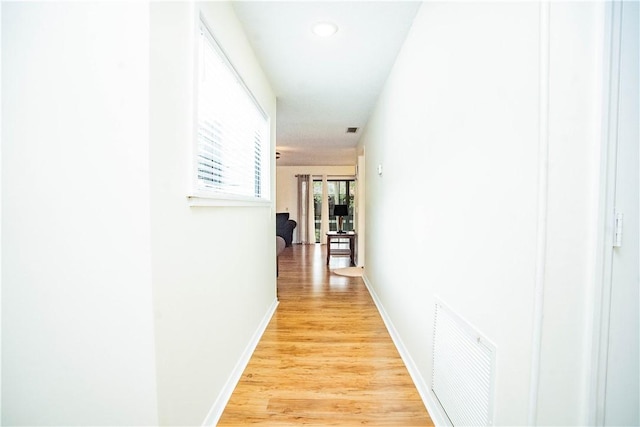 hall featuring light wood-type flooring