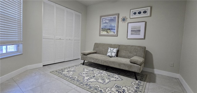 living area featuring light tile patterned floors