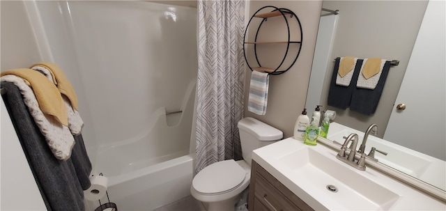 full bathroom with shower / bath combo, vanity, and toilet