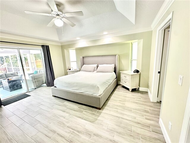 bedroom with light hardwood / wood-style floors, ceiling fan, a textured ceiling, access to exterior, and crown molding