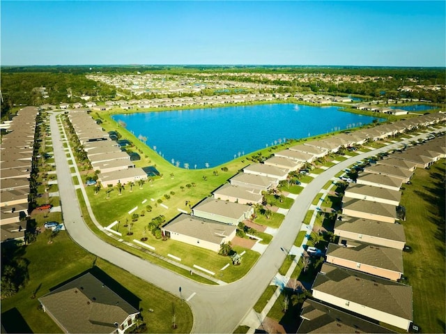 aerial view with a residential view and a water view