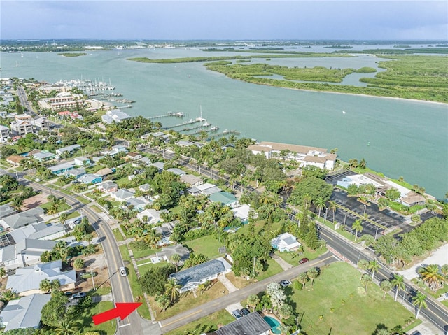 drone / aerial view featuring a water view