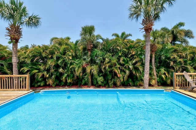 841 Carnation Dr, Sebastian, FL 32958 - outdoor pool featuring a deck