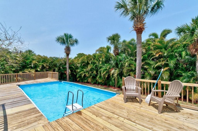 841 Carnation Dr, Sebastian, FL 32958 - outdoor pool featuring a wooden deck