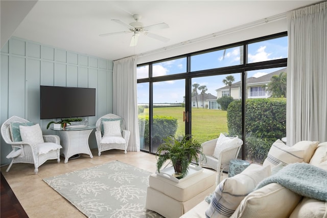 living room featuring ceiling fan