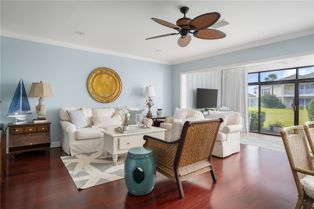 living room with ceiling fan, dark hardwood / wood-style flooring, and crown molding