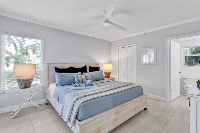 bedroom with ceiling fan, ensuite bathroom, crown molding, light tile patterned floors, and a closet