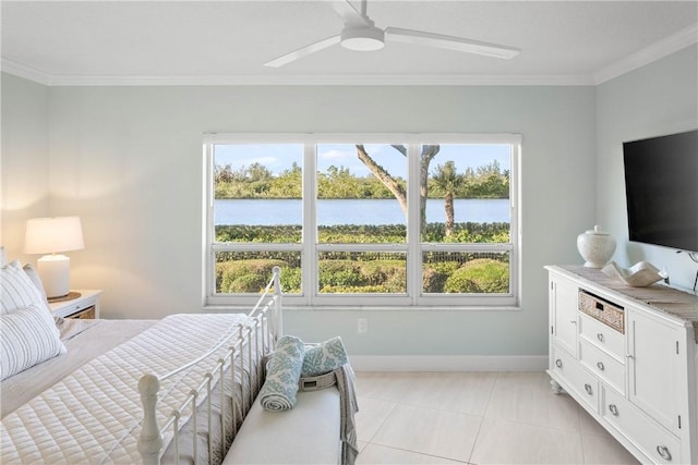 tiled bedroom with ceiling fan and crown molding