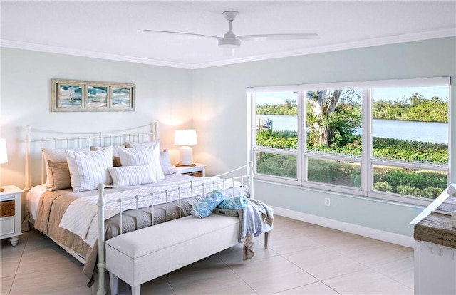 bedroom with a water view, ceiling fan, crown molding, and tile patterned flooring