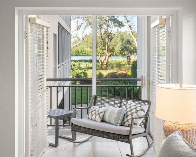 balcony featuring a water view