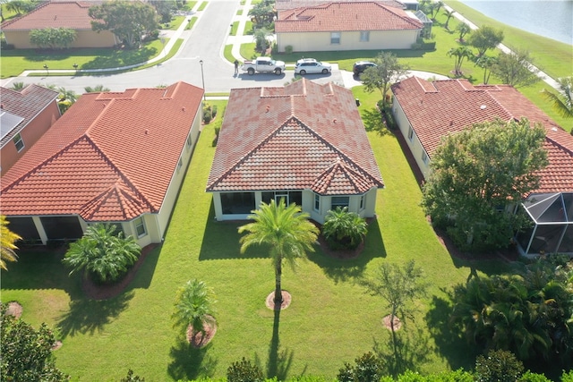 bird's eye view with a water view