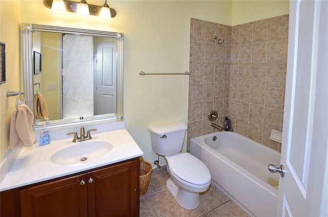 full bathroom with tile patterned flooring, vanity, toilet, and tiled shower / bath combo