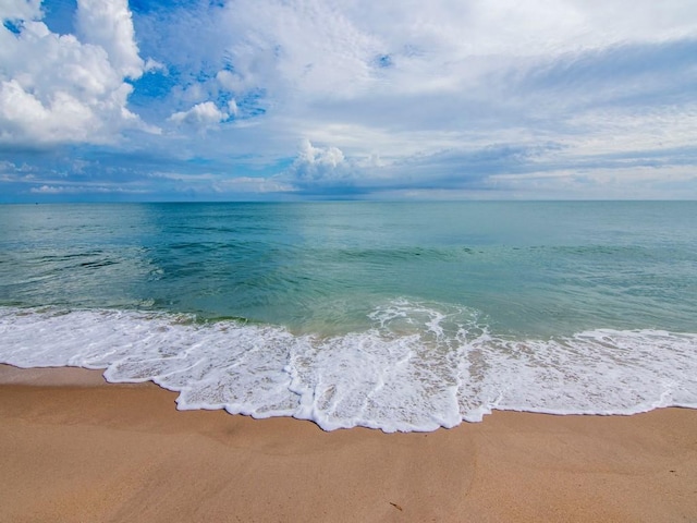 property view of water featuring a view of the beach