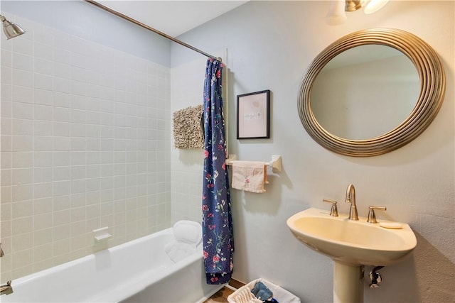 1385 14th Ave, Vero Beach, FL 32960 - full bathroom featuring shower / bath combo with shower curtain and a sink