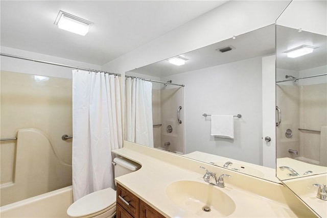 full bathroom featuring shower / bath combo with shower curtain, visible vents, toilet, and vanity