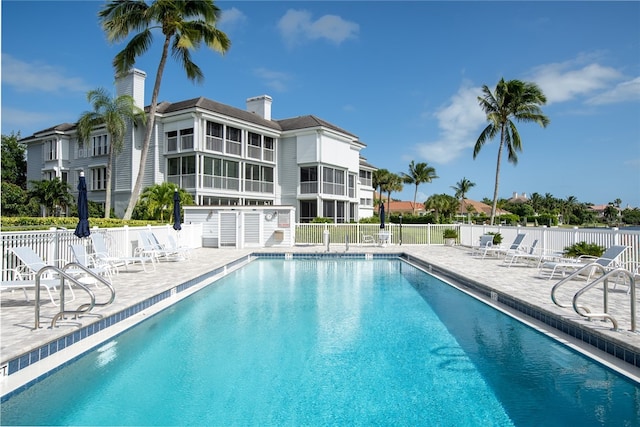 view of swimming pool featuring a patio