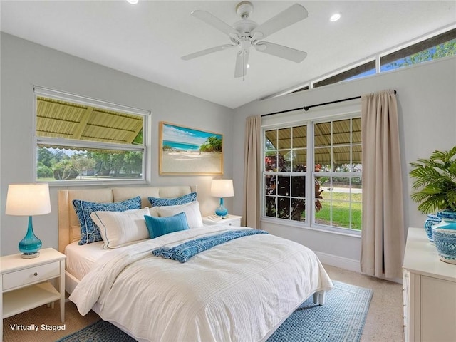 660 14th St, Vero Beach, FL 32960 - bedroom with vaulted ceiling, multiple windows, baseboards, recessed lighting, and a ceiling fan