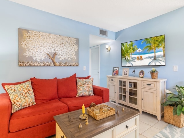 living room with light tile patterned floors