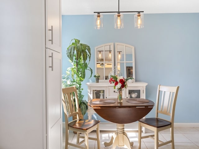 dining area featuring light tile patterned floors