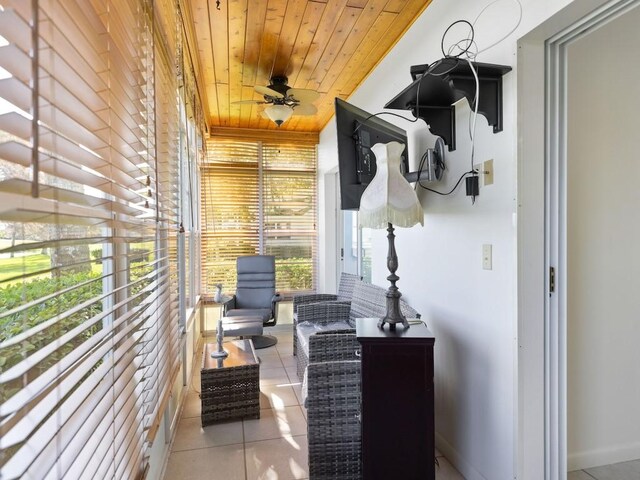 mudroom featuring ceiling fan, wooden ceiling, and light tile patterned flooring