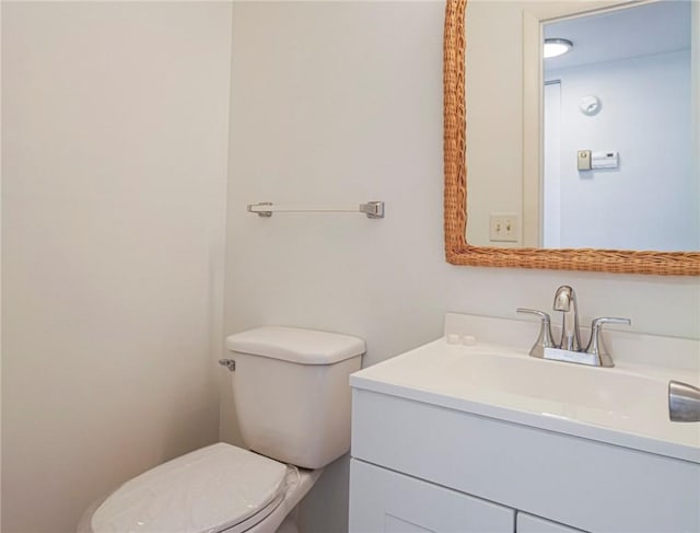 2800 Indian River Blvd Unit L2, Vero Beach, FL 32960 - bathroom featuring vanity and toilet