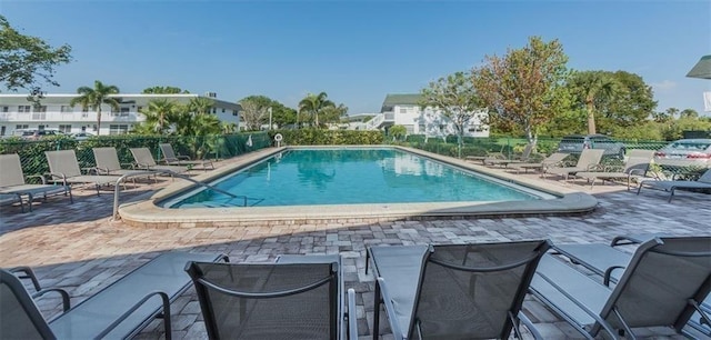 2800 Indian River Blvd Unit L2, Vero Beach, FL 32960 - community pool with a patio area and fence