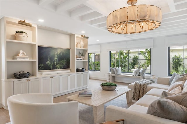 601 Flamevine Ln, Vero Beach, FL 32963 - living room with light wood-type flooring, beam ceiling, a chandelier, recessed lighting, and baseboards