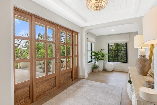 doorway featuring french doors and light hardwood / wood-style floors